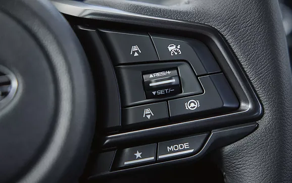 Close-up of the WRX steering wheel mode controls