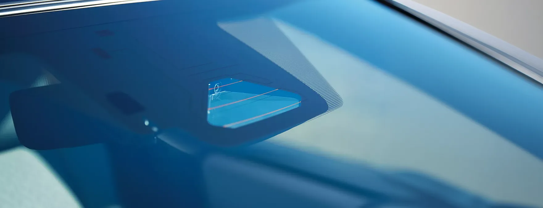 Close-up of the 2026 Subaru Solterra windshield and EyeSight camera housing