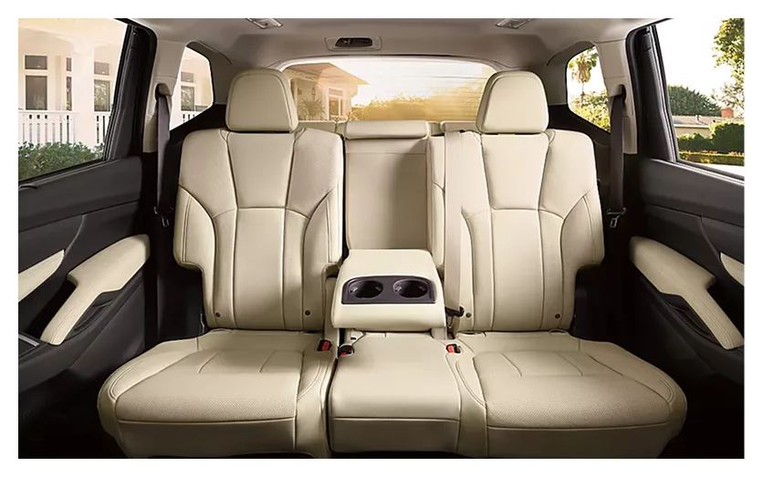 Cream leather-trimmed second- and third-row seats with cup holders within reach