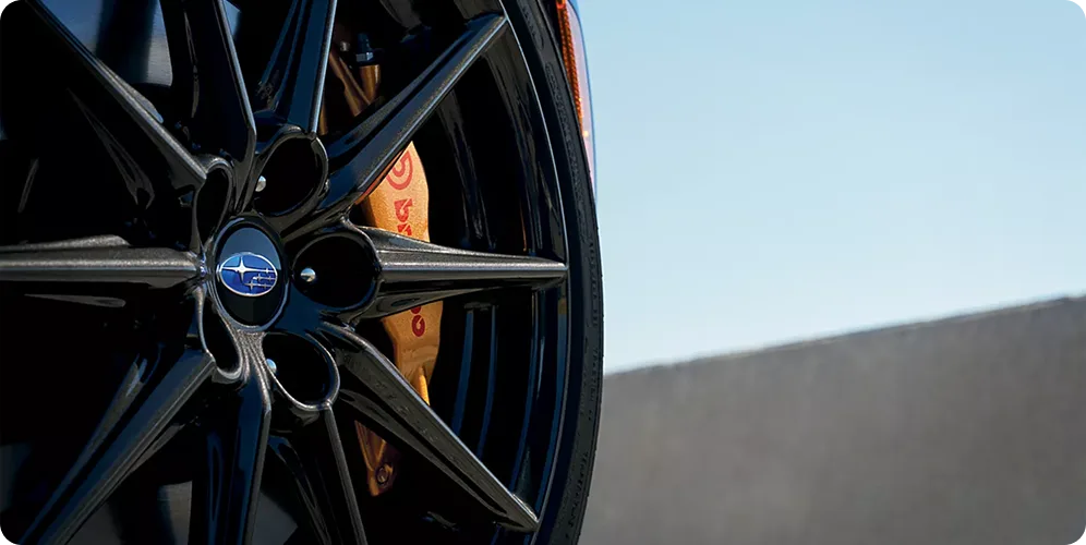 Close-up of the BRZ tS wheel and gold Brembo brake caliper