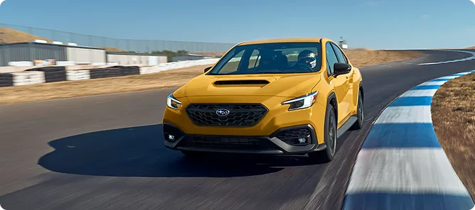 Yellow WRX Series.Yellow cornering on a track