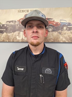 Staff member Tanner from ID_65f726d81374