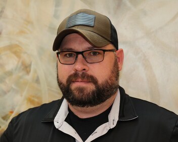 Staff member Cody Roberts from ID_aa1e1ae8a4f8