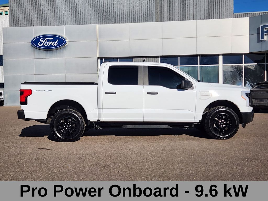 Used 2023 Ford F-150 Lightning Pro with VIN 1FTVW1EL7PWG29551 for sale in Denver, CO