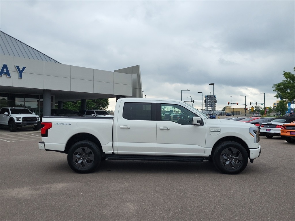 Used 2023 Ford F-150 Lightning Lariat with VIN 1FT6W1EV2PWG63130 for sale in Denver, CO