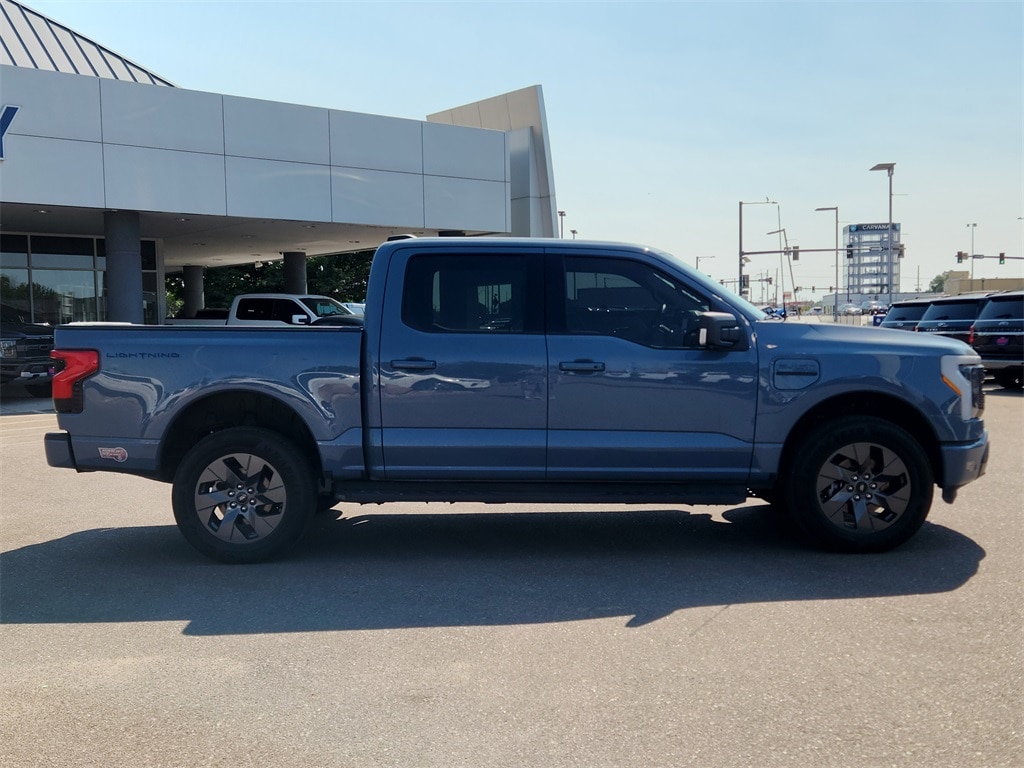 Used 2023 Ford F-150 Lightning XLT with VIN 1FTVW1EL2PWG28548 for sale in Denver, CO