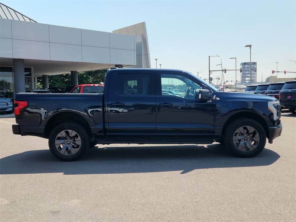 Used 2024 Ford F-150 Lightning Flash with VIN 1FT6W3L78RWG11083 for sale in Denver, CO
