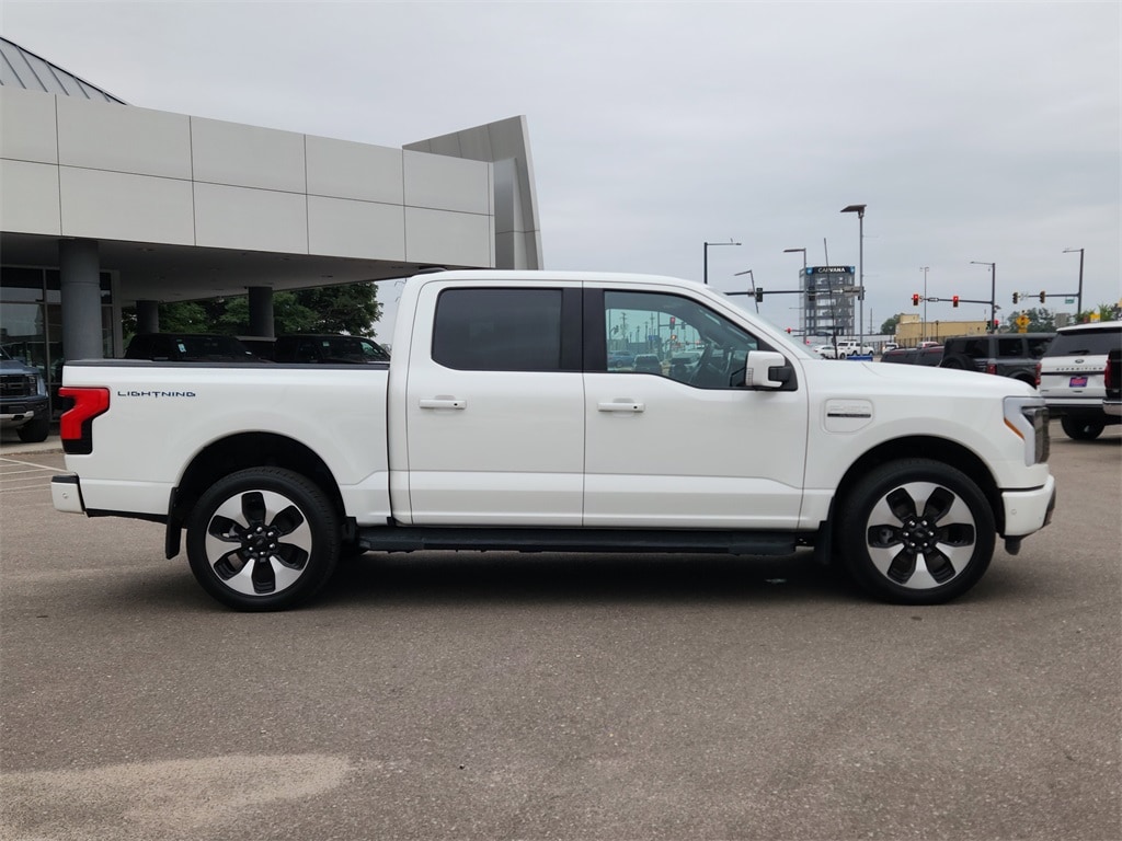 Used 2022 Ford F-150 Lightning Platinum with VIN 1FT6W1EV0NWG02937 for sale in Denver, CO
