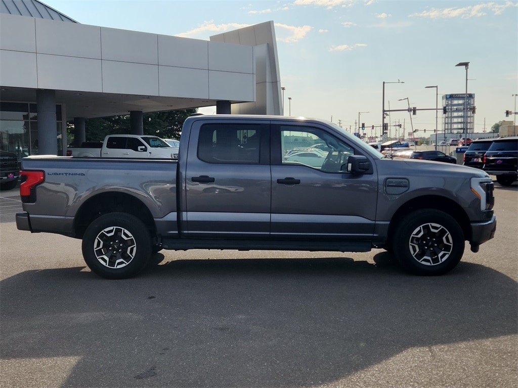 Used 2023 Ford F-150 Lightning XLT with VIN 1FTVW1ELXPWG13571 for sale in Denver, CO