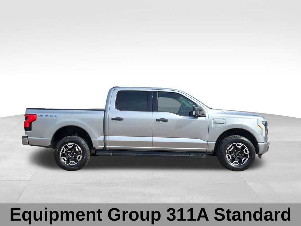Used 2023 Ford F-150 Lightning XLT with VIN 1FTVW1EL1PWG63761 for sale in Denver, CO