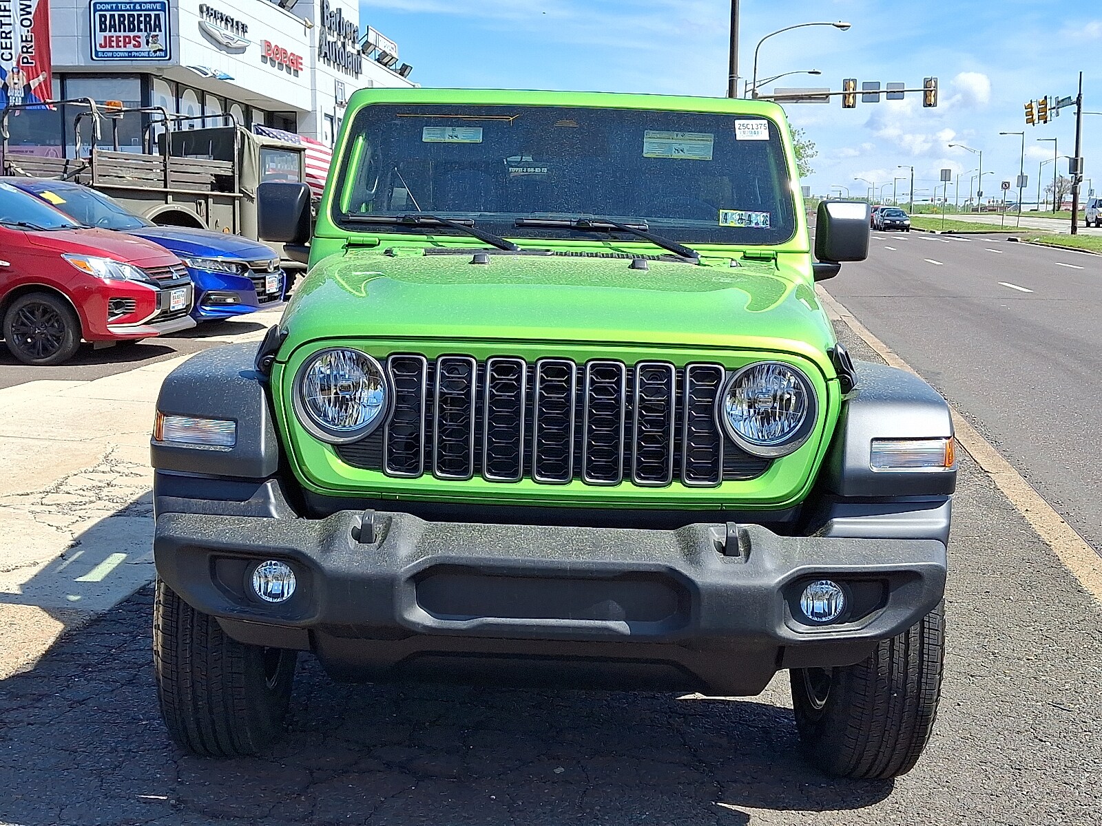 2025 Jeep Wrangler Sport photo 2