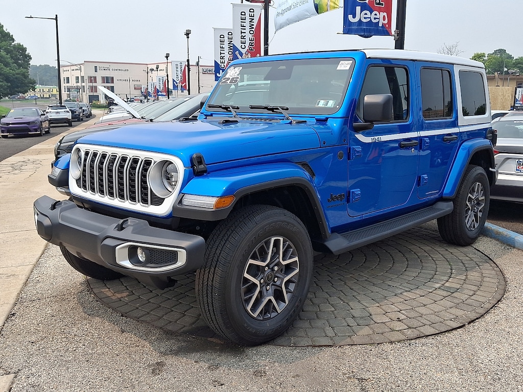 New 2026 Jeep Wrangler 4-DOOR SAHARA Sport Utility