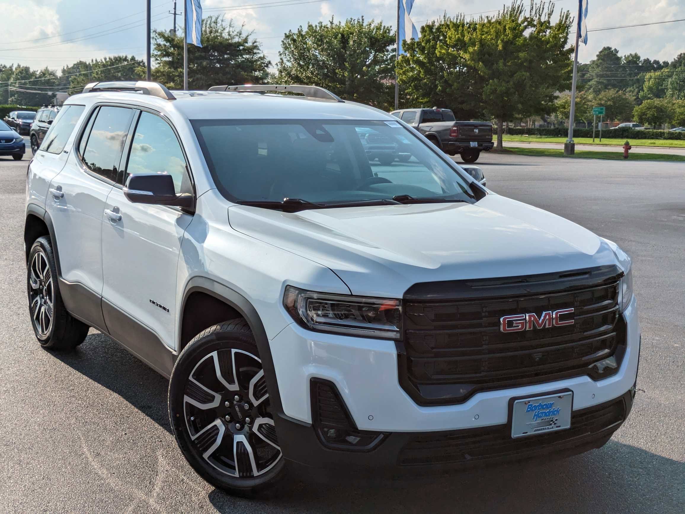 Used 2021 GMC Acadia SLT with VIN 1GKKNML44MZ118574 for sale in Greenville, NC