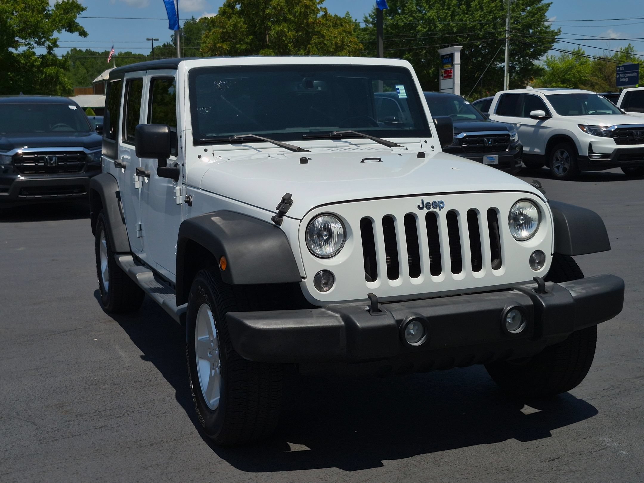Used 2016 Jeep Wrangler Unlimited Sport S with VIN 1C4BJWDG4GL178731 for sale in Greenville, NC