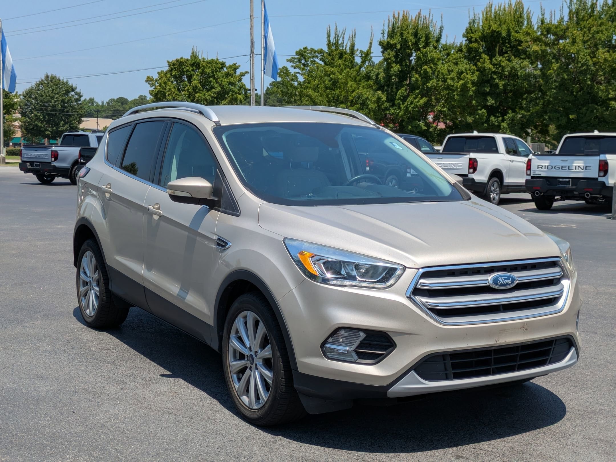 Used 2017 Ford Escape Titanium with VIN 1FMCU0JD0HUC13288 for sale in Greenville, NC