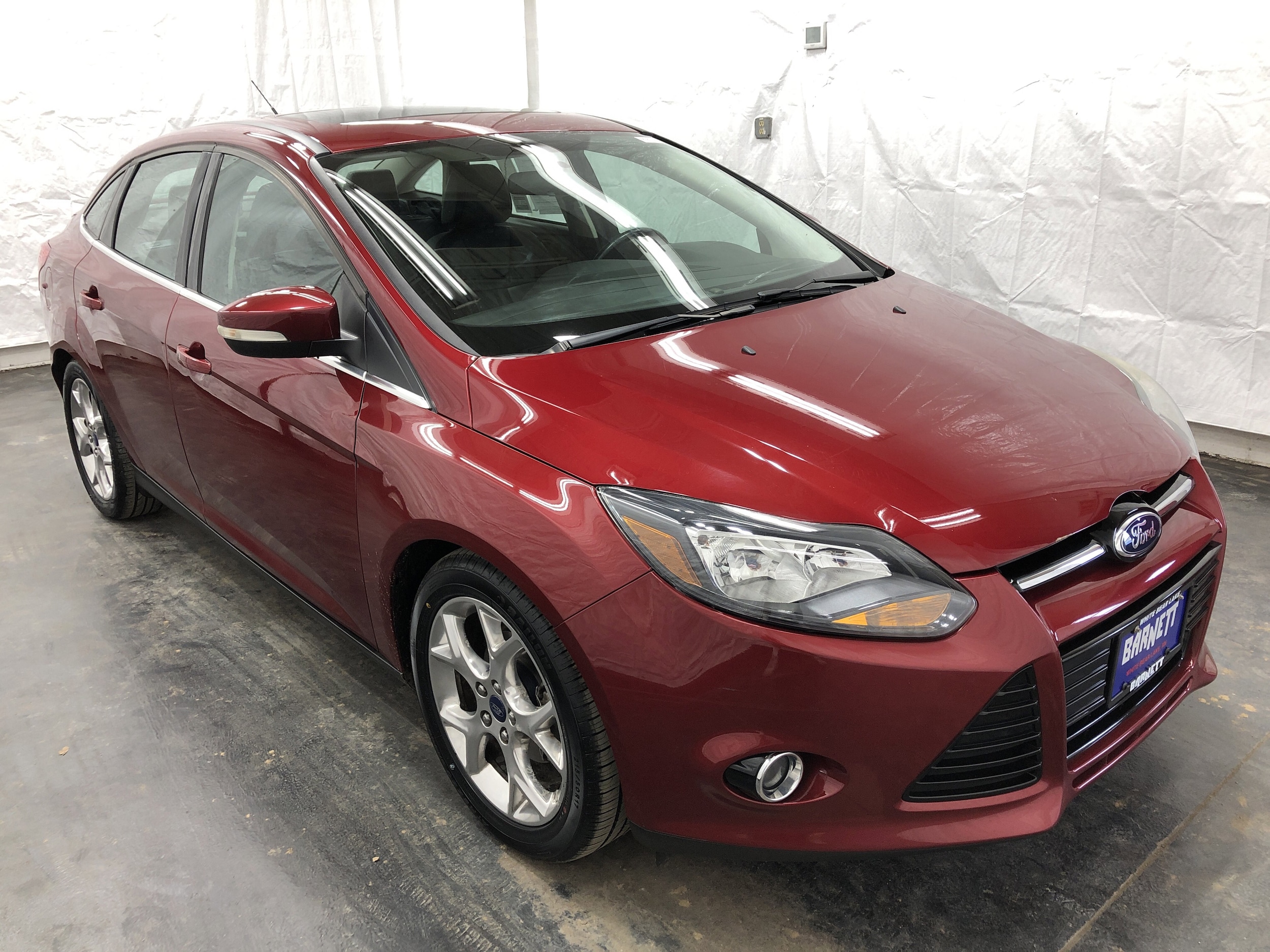 Used 2014 Ford Focus Titanium with VIN 1FADP3J2XEL420620 for sale in Saint Paul, Minnesota