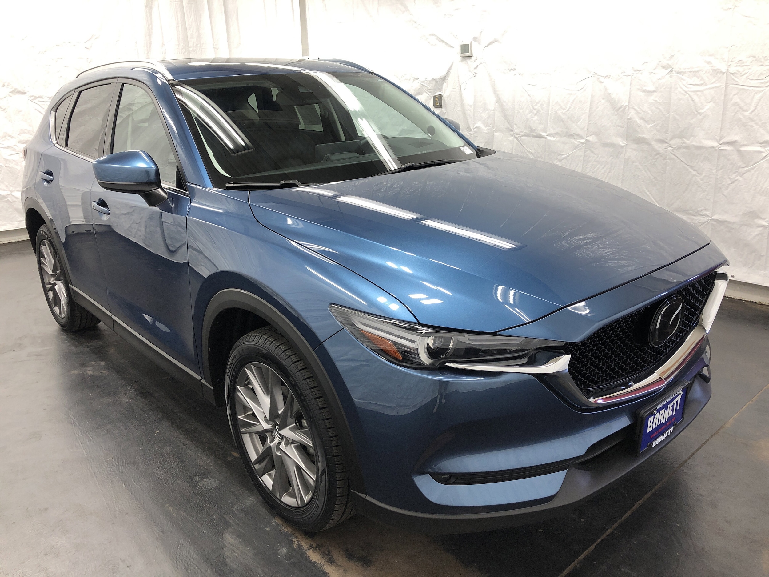 Used 2021 Mazda CX-5 Grand Touring with VIN JM3KFBDM0M0417258 for sale in Saint Paul, Minnesota