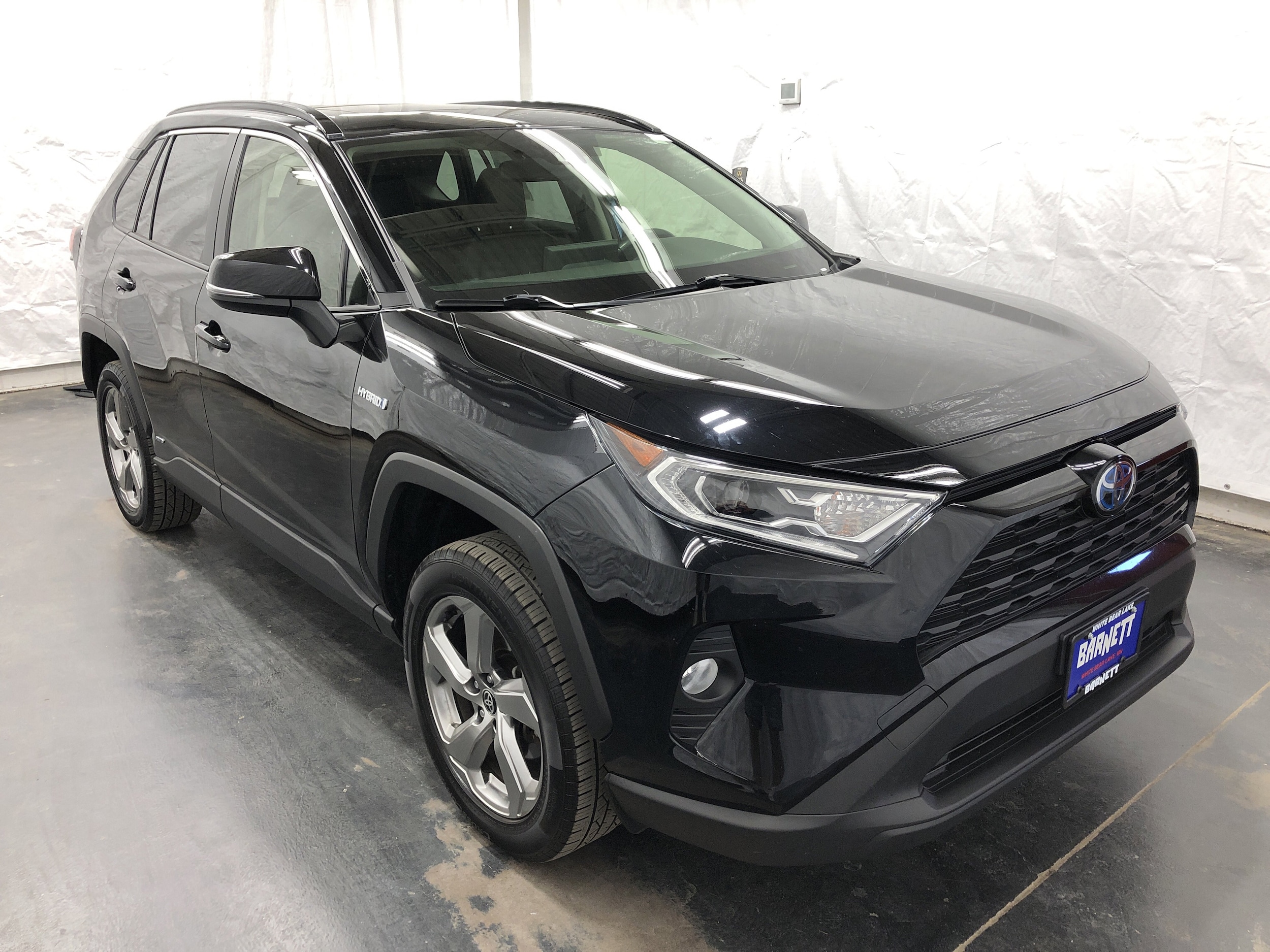 Used 2021 Toyota RAV4 XLE Premium with VIN JTMB6RFV1MJ011815 for sale in Saint Paul, Minnesota