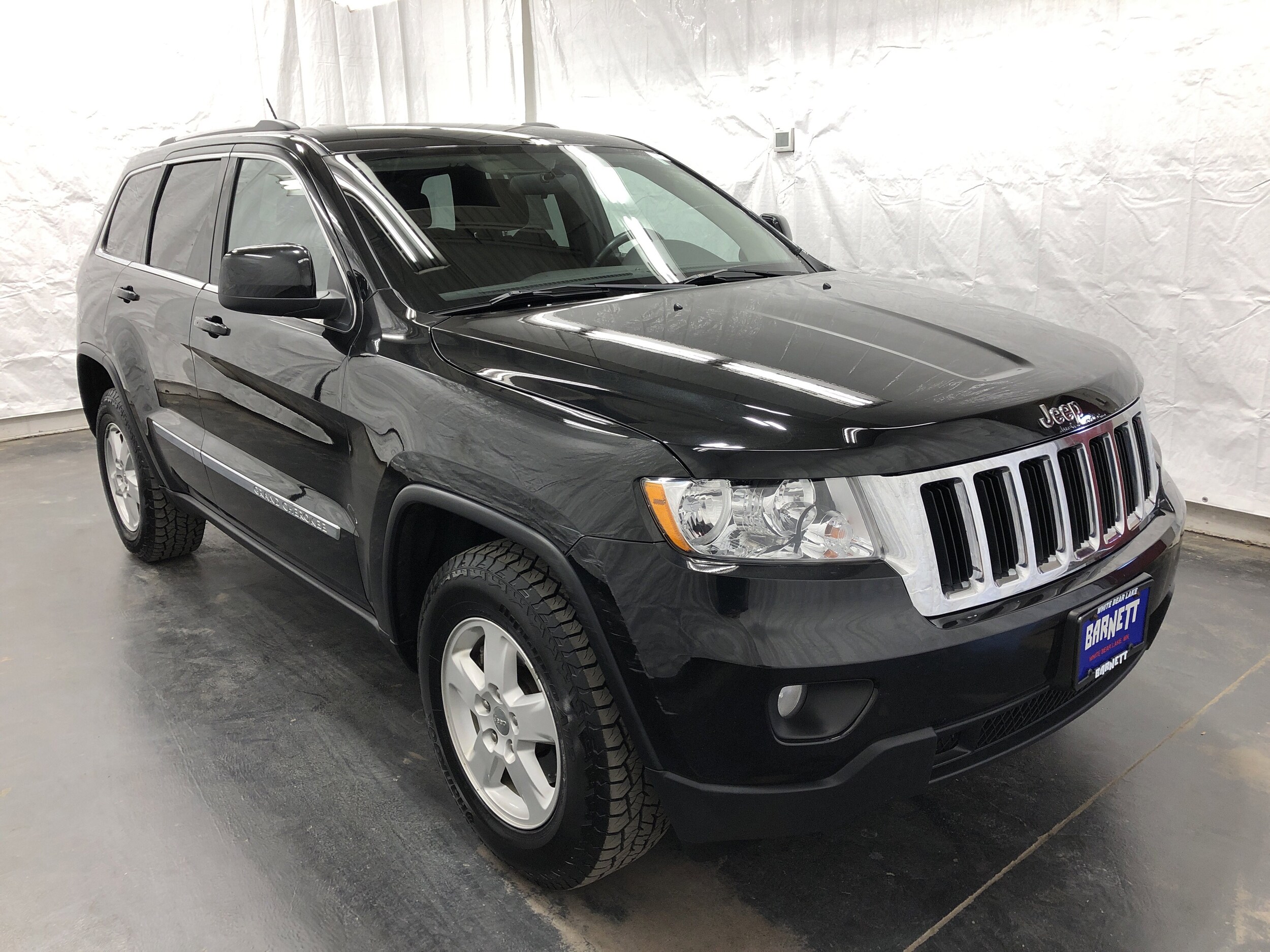 Used 2012 Jeep Grand Cherokee Laredo with VIN 1C4RJFAGXCC141485 for sale in Saint Paul, Minnesota