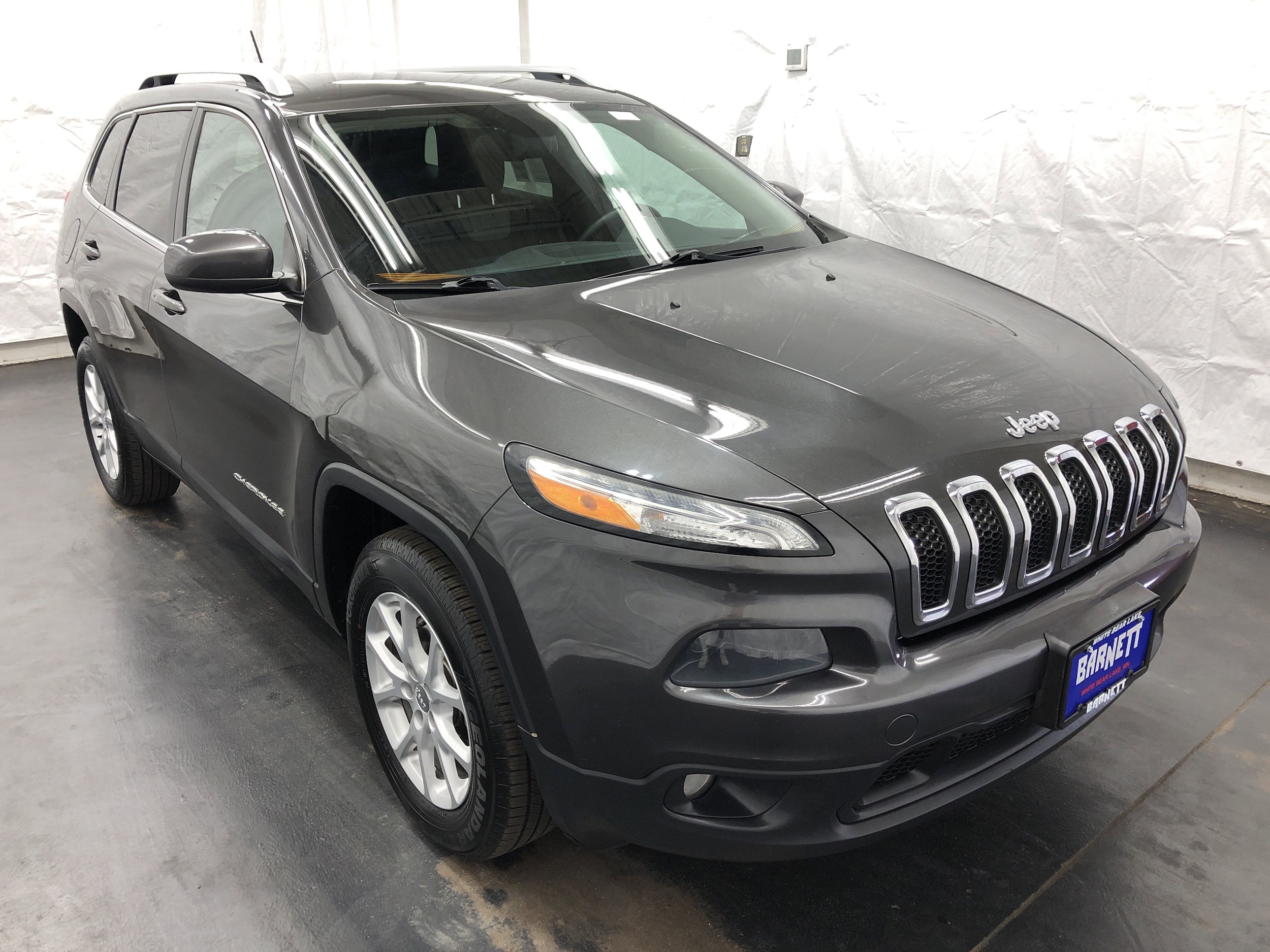 Used 2014 Jeep Cherokee Latitude with VIN 1C4PJMCS0EW229735 for sale in White Bear Lake, Minnesota