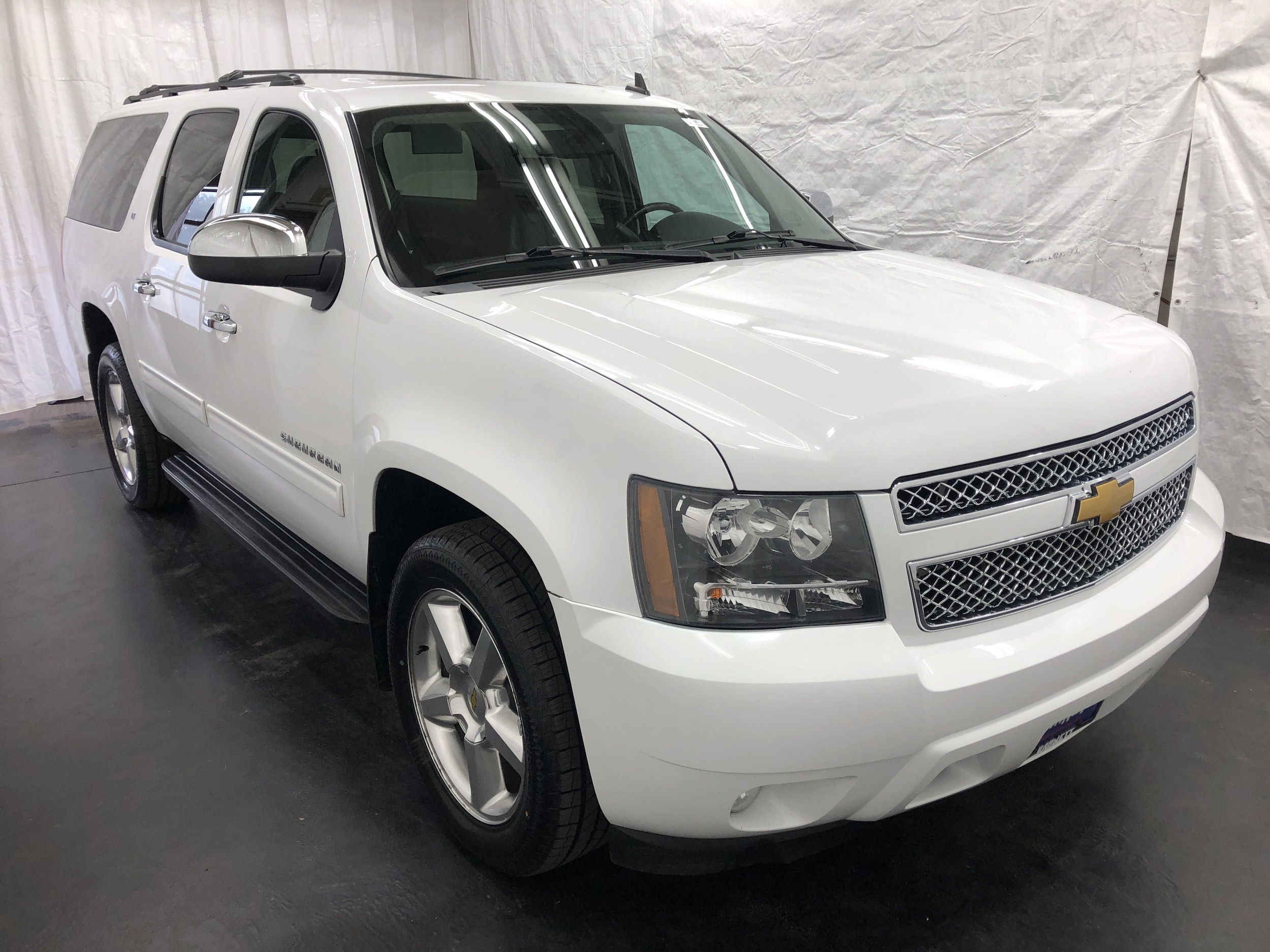 Used 2013 Chevrolet Suburban LT with VIN 1GNSKJE77DR115055 for sale in Saint Paul, Minnesota
