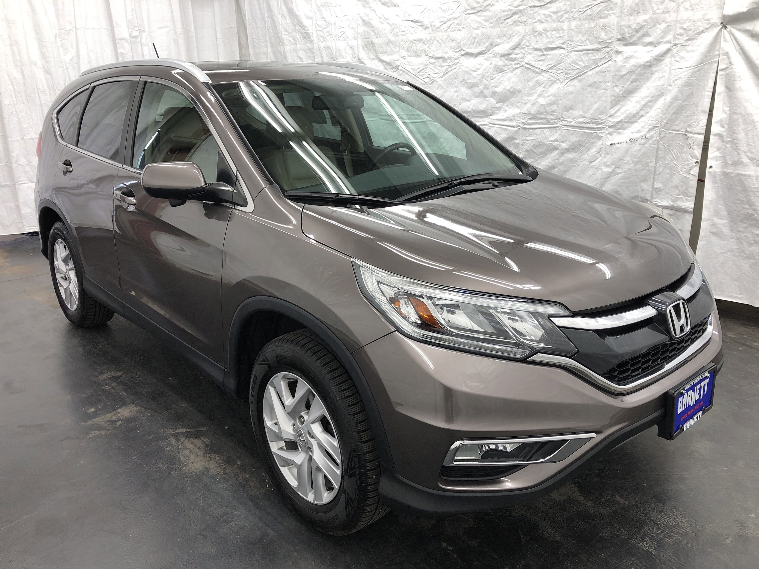 Used 2016 Honda CR-V EX-L with VIN 2HKRM4H71GH671047 for sale in White Bear Lake, Minnesota