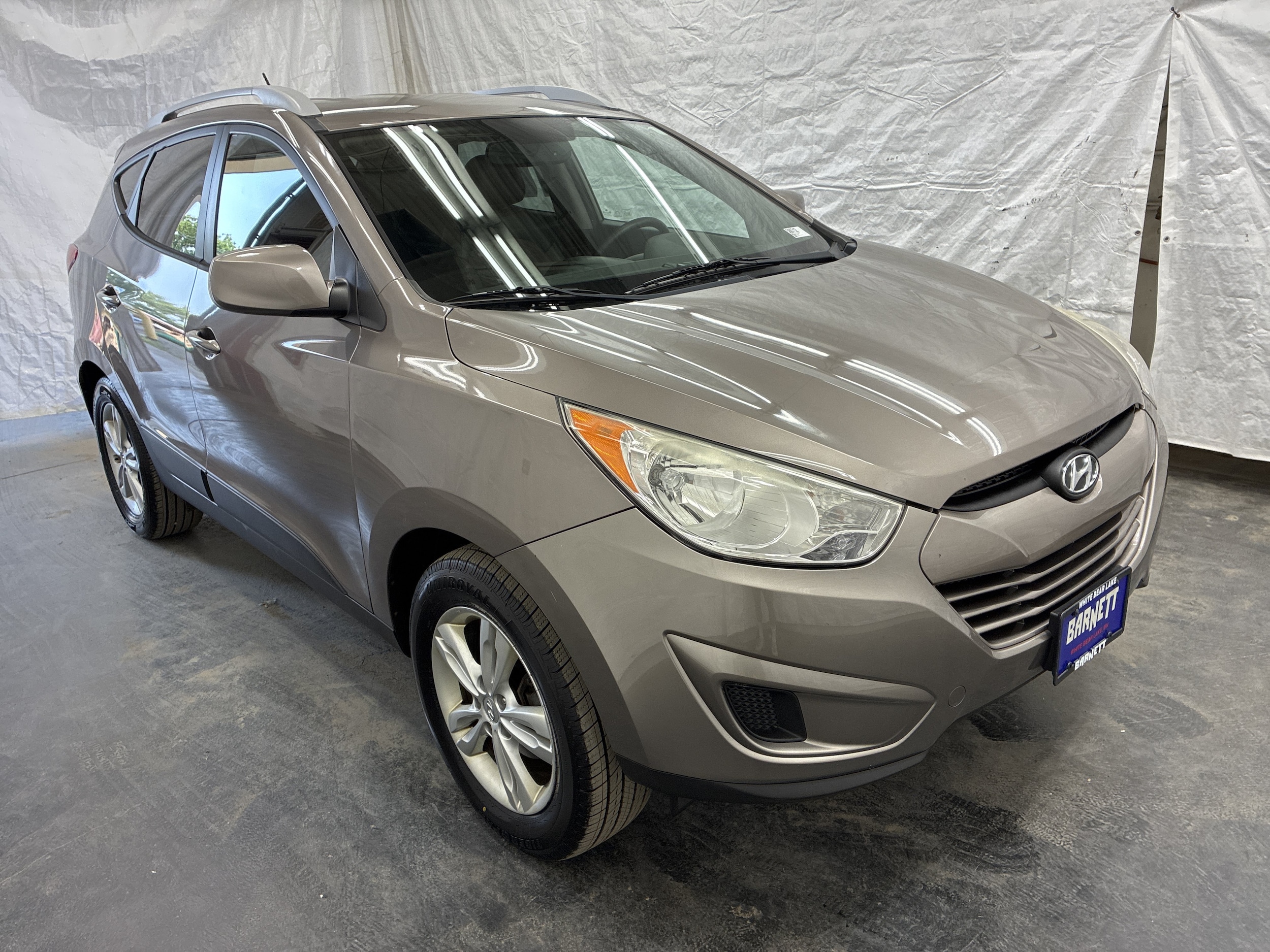 Used 2011 Hyundai Tucson GLS with VIN KM8JU3ACXBU291861 for sale in Saint Paul, Minnesota
