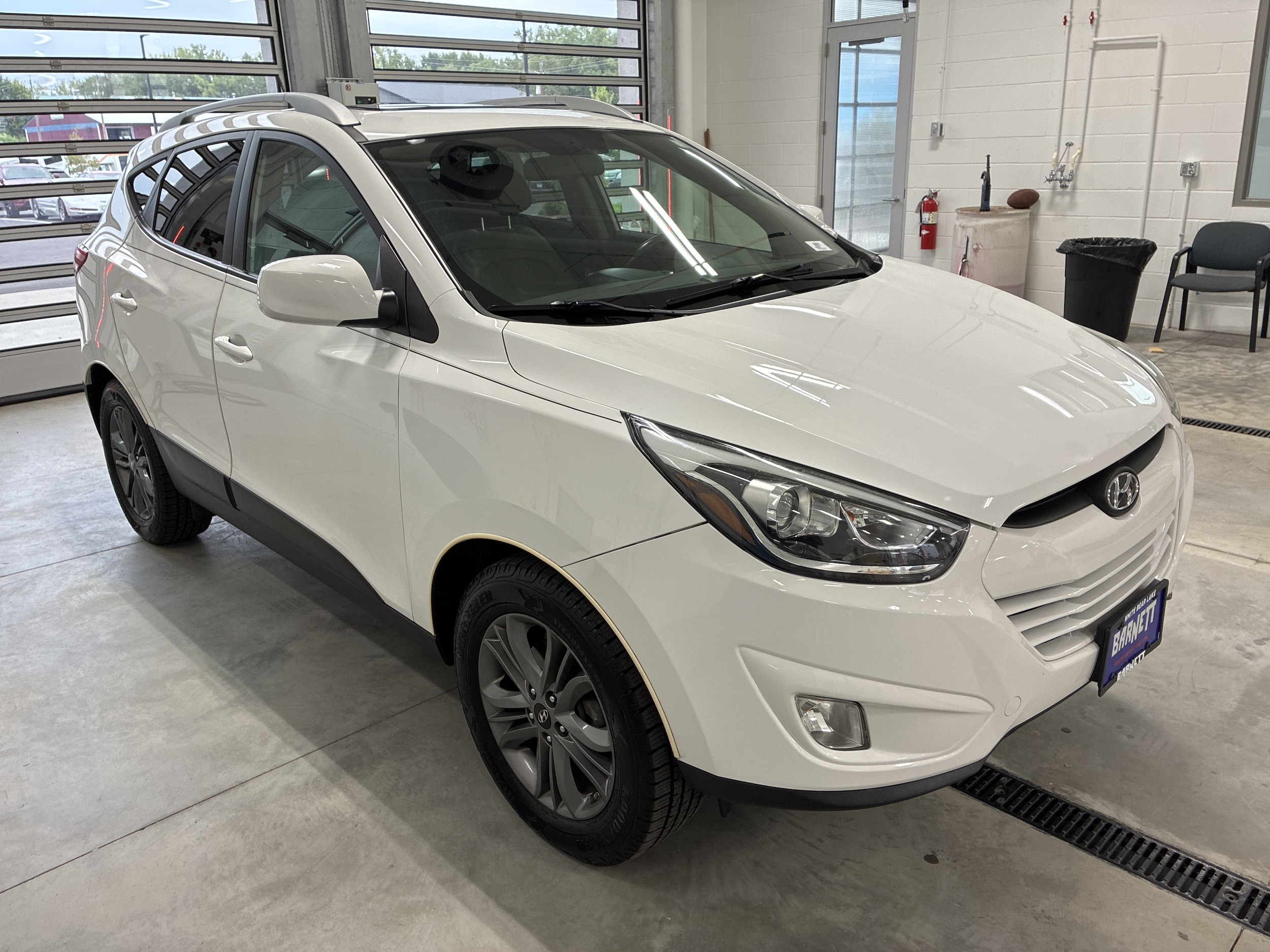 Used 2014 Hyundai Tucson SE with VIN KM8JUCAGXEU819812 for sale in Saint Paul, Minnesota