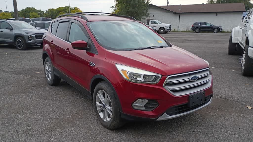 Used 2018 Ford Escape SE with VIN 1FMCU9GD2JUB38644 for sale in Niagara Falls, NY