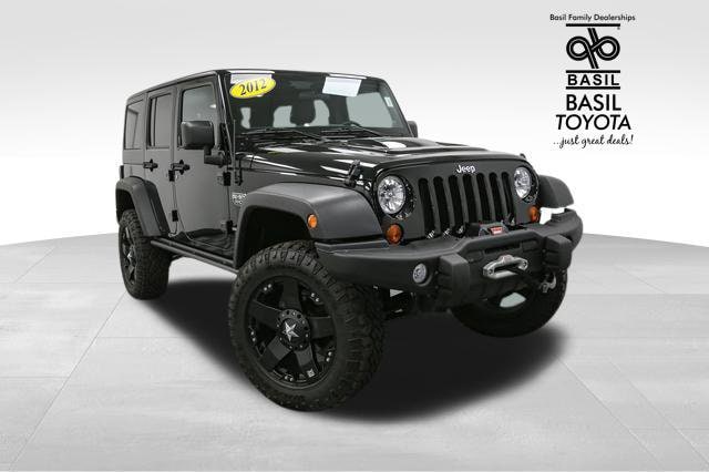 Used 2012 Jeep Wrangler Unlimited Rubicon with VIN 1C4BJWFG0CL208718 for sale in Lockport, NY