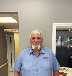 Staff member Tim Wolf from 062196489994