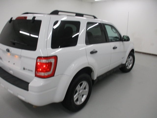 Used 2010 Ford Escape Hybrid with VIN 1FMCU5K30AKC85693 for sale in Battle Creek, MI