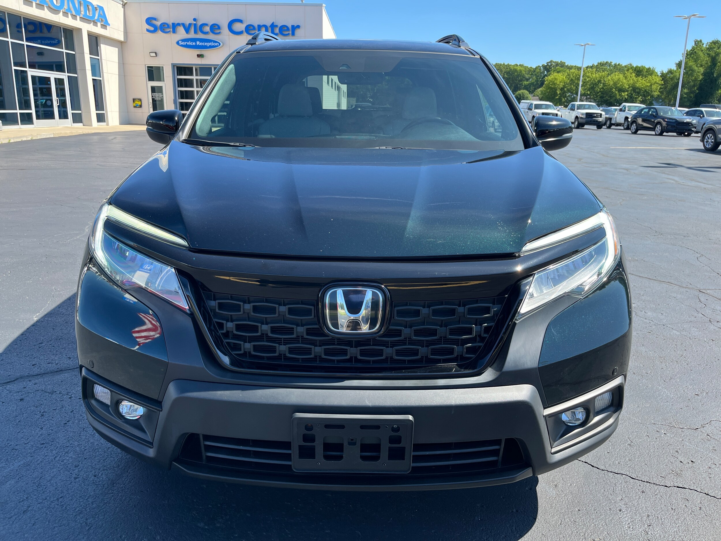 Used 2019 Honda Passport Touring with VIN 5FNYF8H94KB002261 for sale in Battle Creek, MI