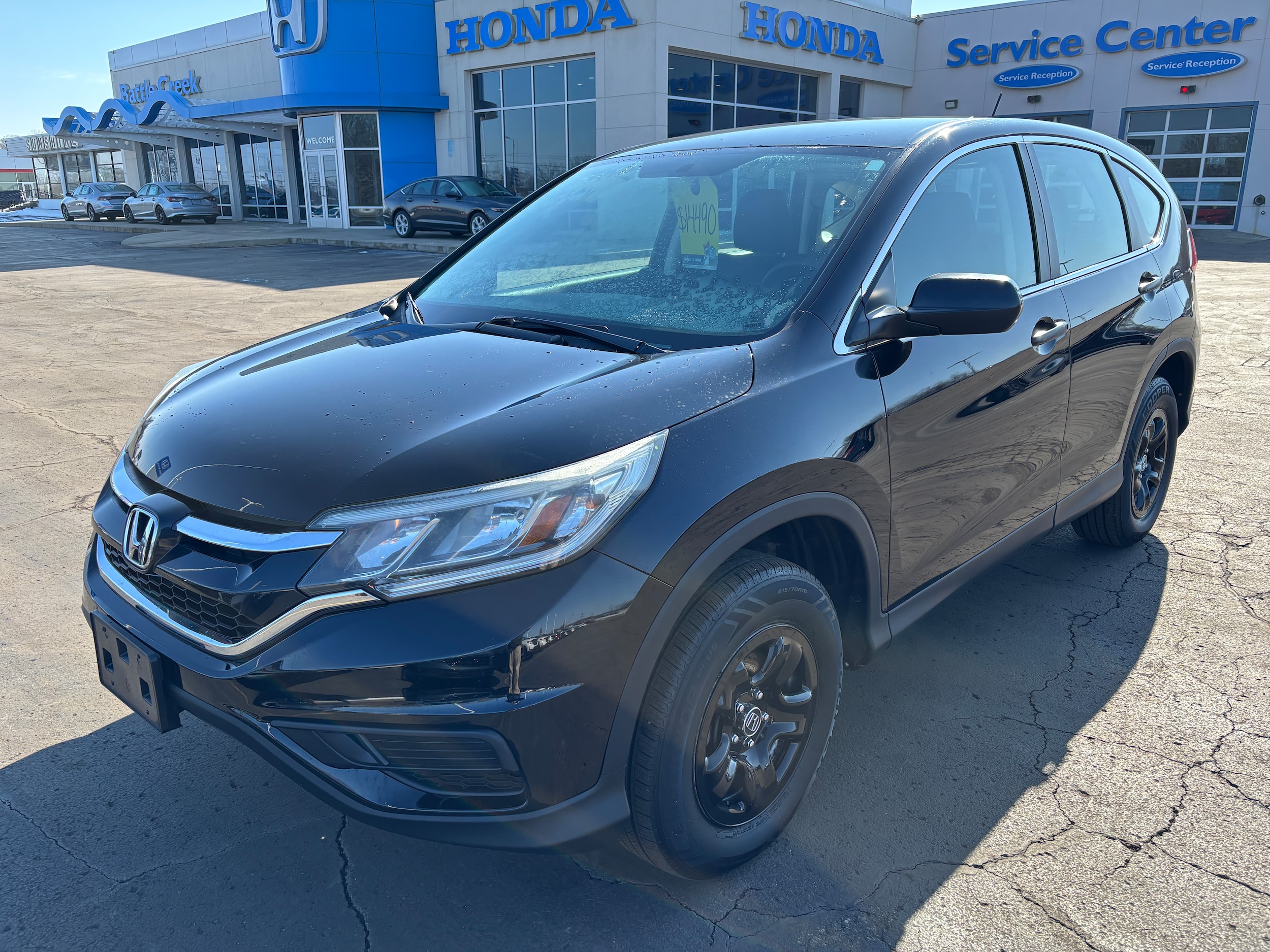Used 2015 Honda CR-V LX with VIN 2HKRM4H34FH635199 for sale in Springfield, MI