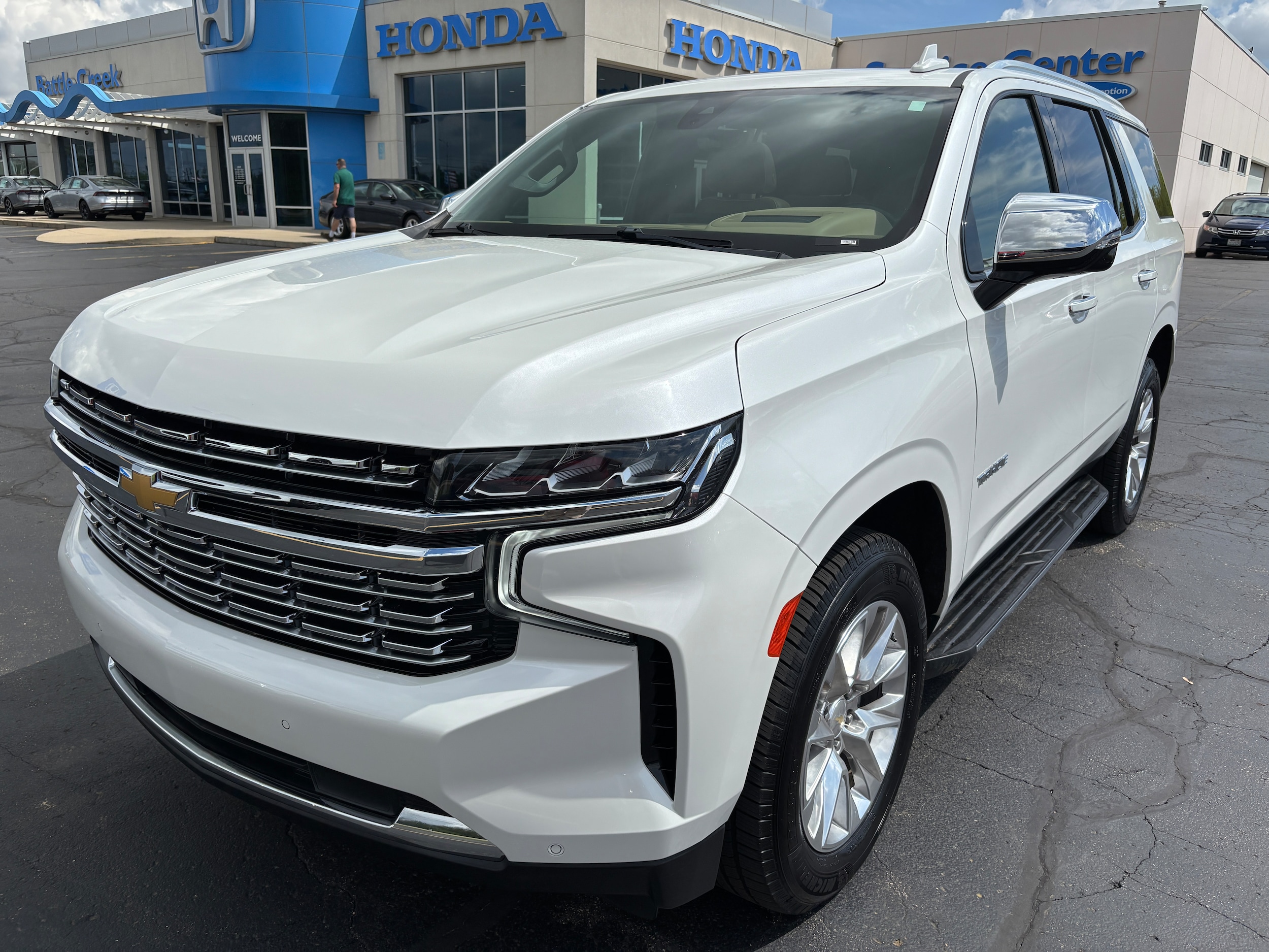 Used 2021 Chevrolet Tahoe Premier with VIN 1GNSKSKD9MR412084 for sale in Battle Creek, MI