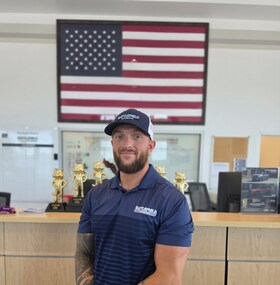 Staff member Justin Sutherland from ID_6a77b63d5f4f