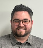 Staff member JOHN POLHE from 1b98e1baca7e