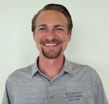 Staff member Nick Paul from ID_43e0407e1901