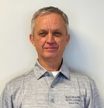 Staff member Mike Mullins from ID_43e0407e1901