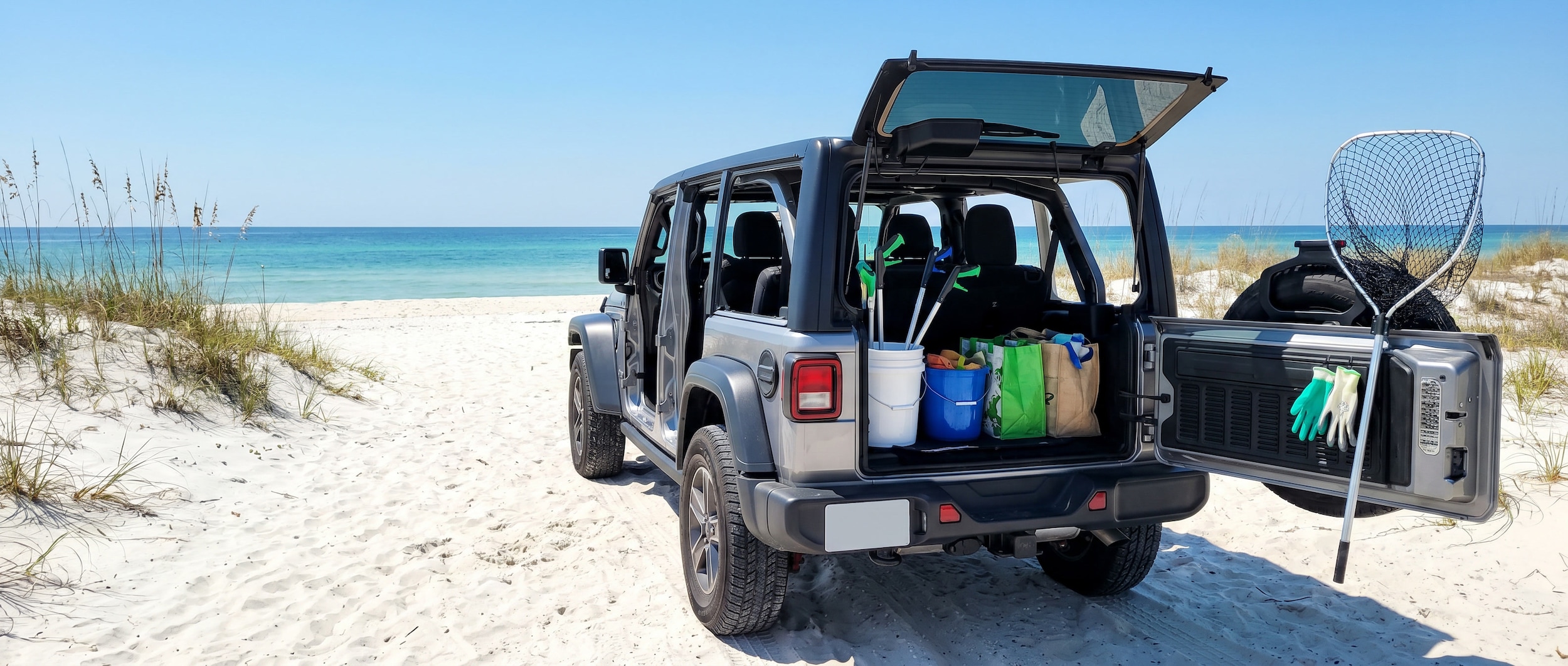 Jeep Wrangler equipped with beach cleanup gear at Panama City Beach, FL