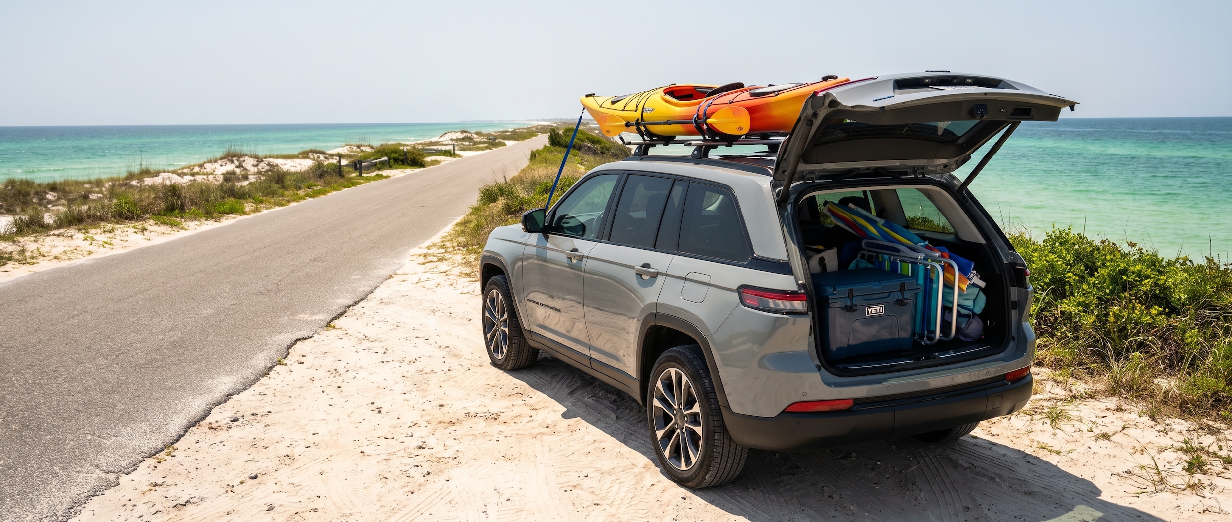 2026 Jeep Grand Cherokee packed for a Cape San Blas beach day trip, sandy pull-off, Florida Panhandle Gulf Coast