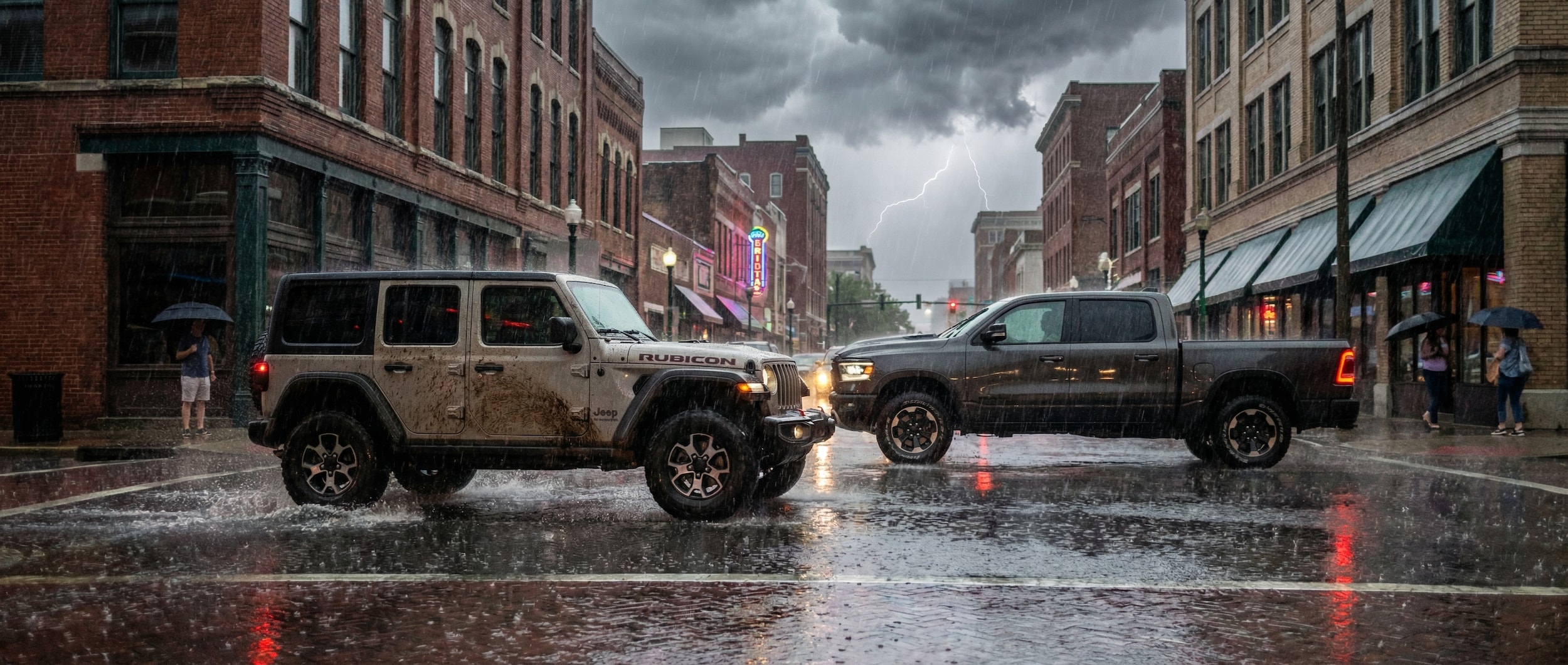 Jeep and Ram vehicles navigating wet roads in Birmingham AL during April rain