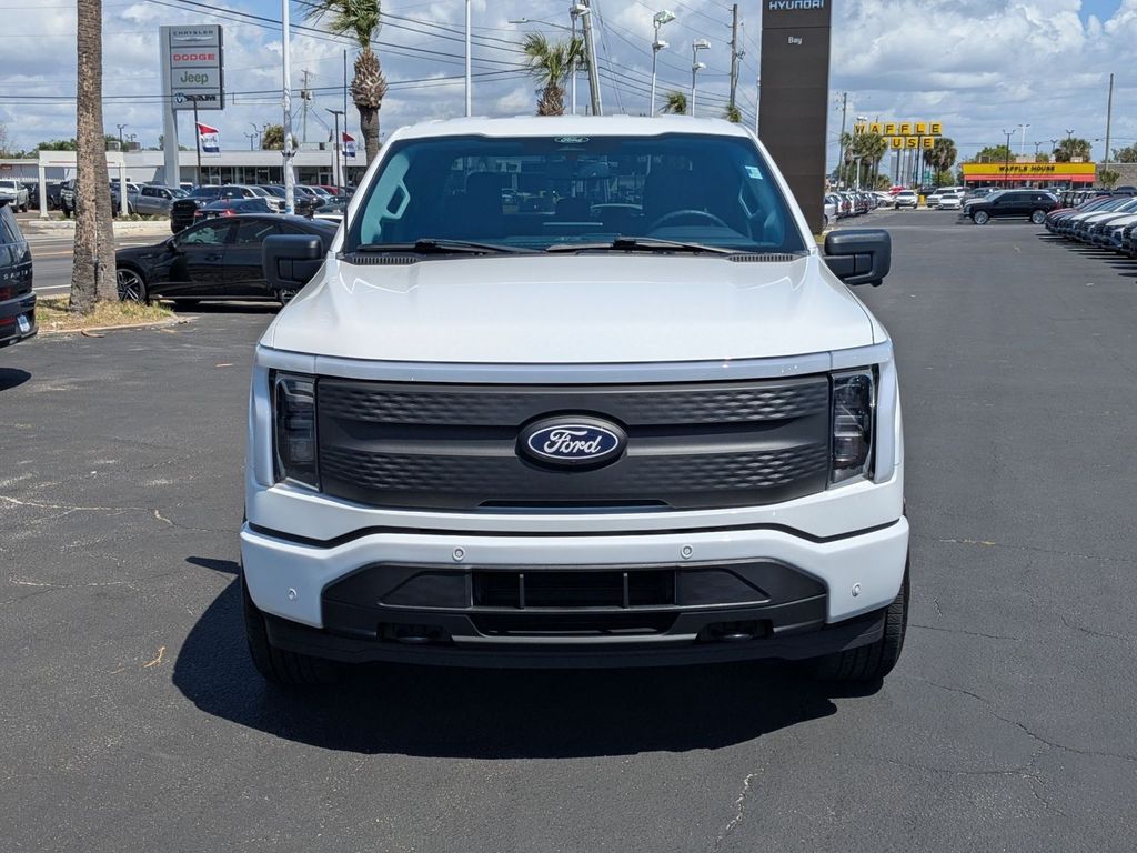 Used 2024 Ford F-150 Lightning Flash with VIN 1FT6W3L77RWG21815 for sale in Panama City, FL