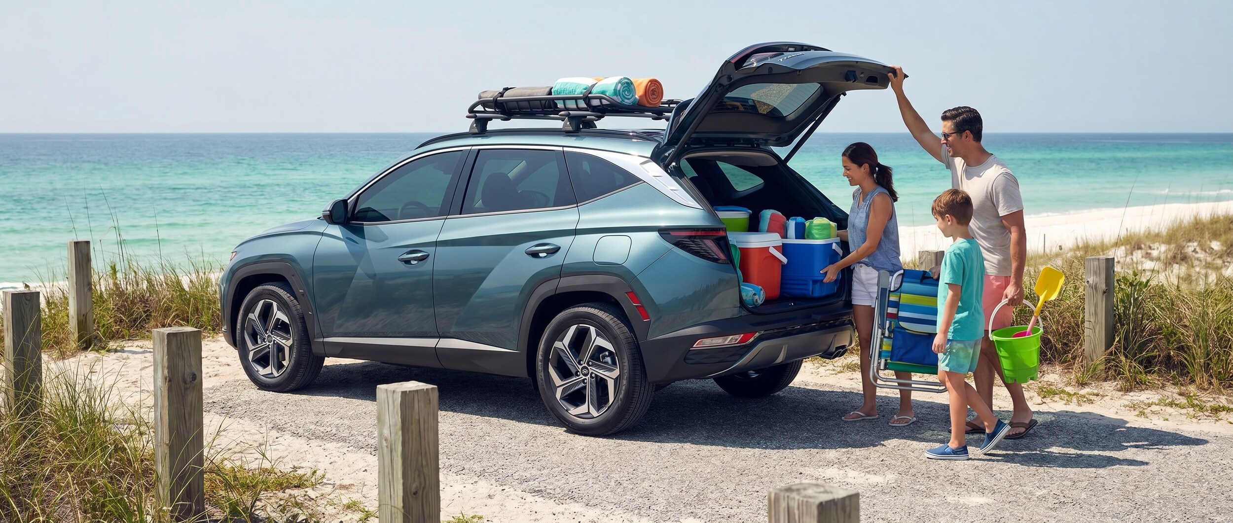 Hyundai Tucson family SUV at St. Andrews State Park beach in Panama City, FL