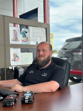 Staff member Alex Matheny from feda6355ae86