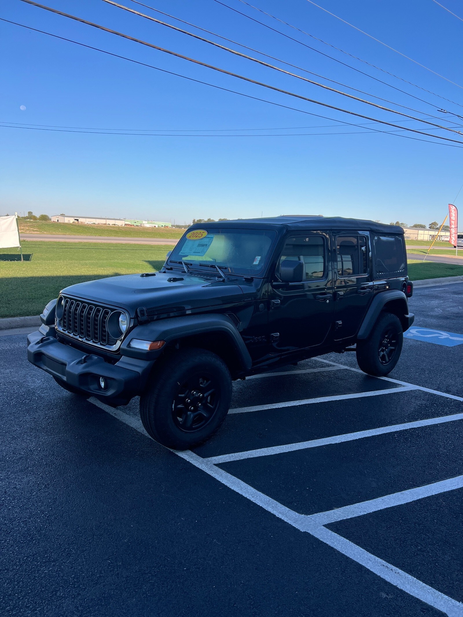 2025 Jeep Wrangler Sport photo 2