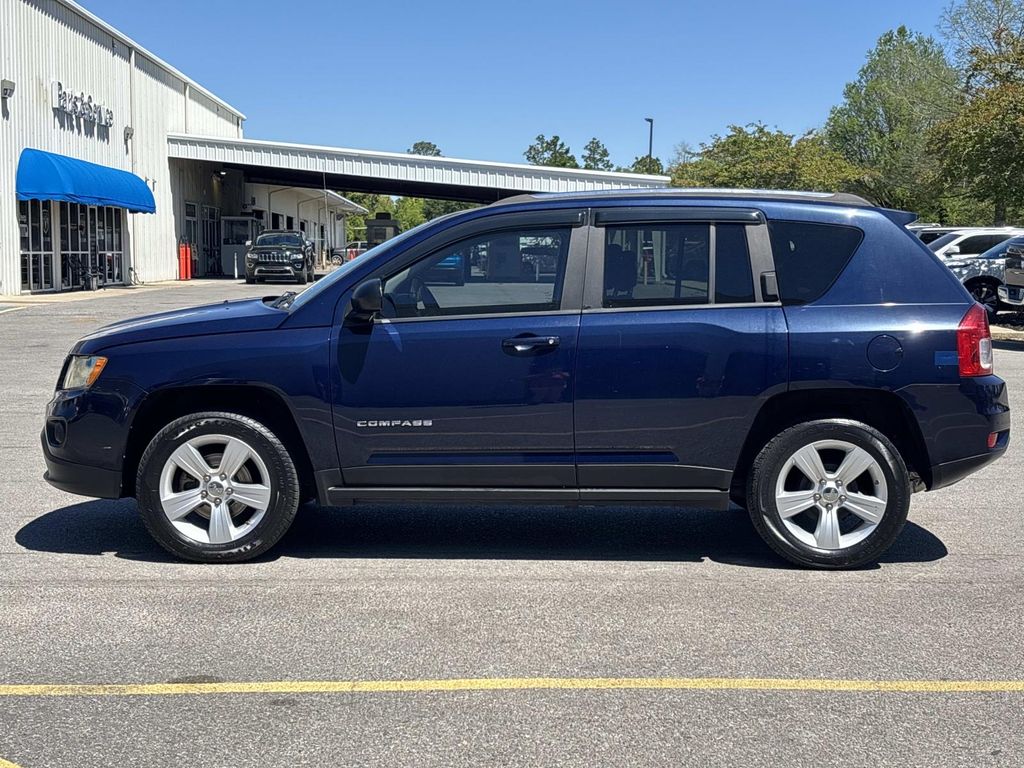 Used 2012 Jeep Compass Sport with VIN 1C4NJCBB9CD627215 for sale in Panama City, FL