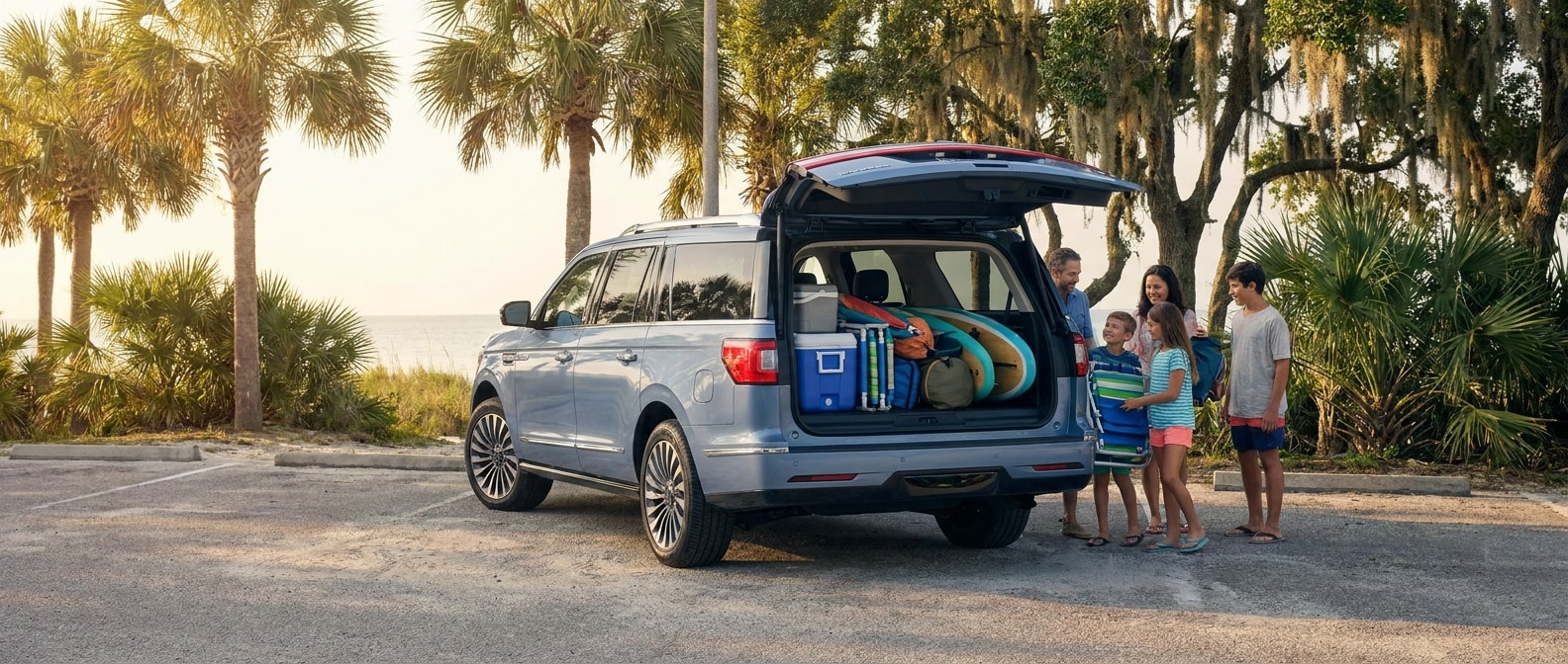 2026 Lincoln Navigator L with rear Split Gate tailgate open, packed for a family outing to the Science and Discovery Center in Panama City, FL