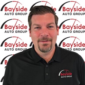 Staff member Sean Ernest  from ID_a7a14217db72