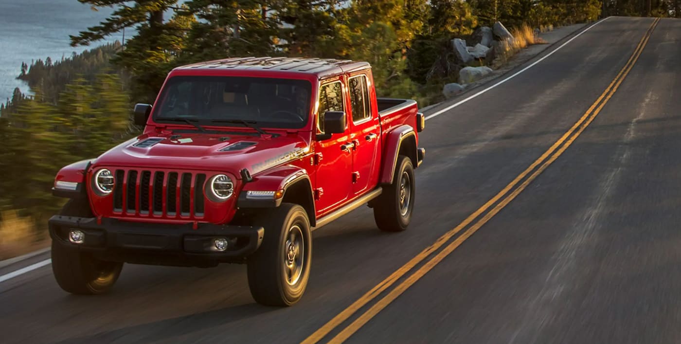 2021 Jeep Gladiator driving down the road